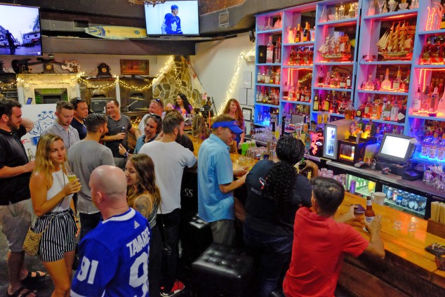  People Socialising at The Lodge Cayman Bar 