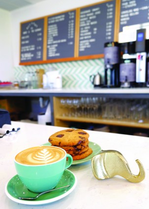  water and Elephant Coffee and cookies 